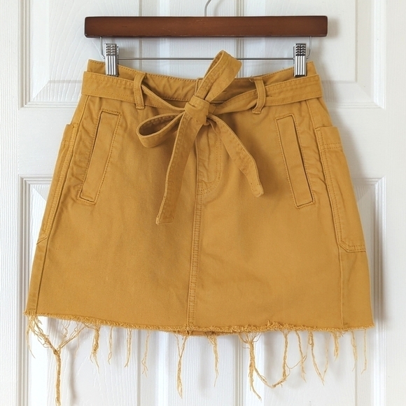 PacSun High Waisted Tie Belted Raw Hem A-Line Denim Mini Skirt Mustard Yellow 26 - Picture 1 of 13